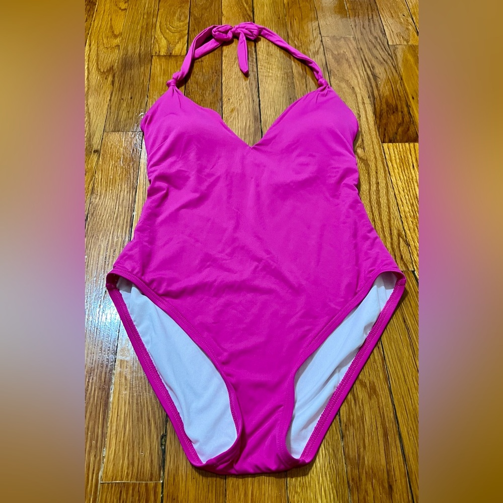 Loft one piece pink, low cut swim suit in size small. Never worn!